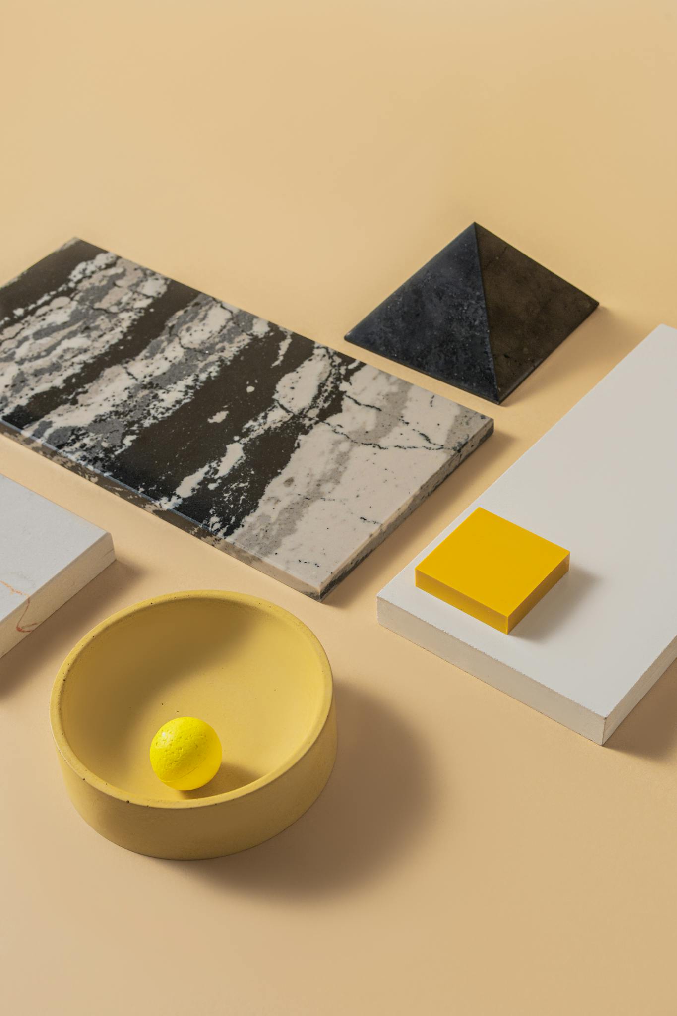 A visually striking minimalist composition featuring geometric shapes on a beige backdrop, showcasing modern design.